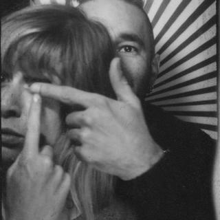 a b&w portrait of the artists